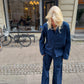 Sofie is 170 cm tall and wears size M. 