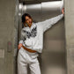 Sofi is 181 cm tall and wears size L. | loose grey