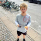 Peter is 188 cm tall and wears size L. | white