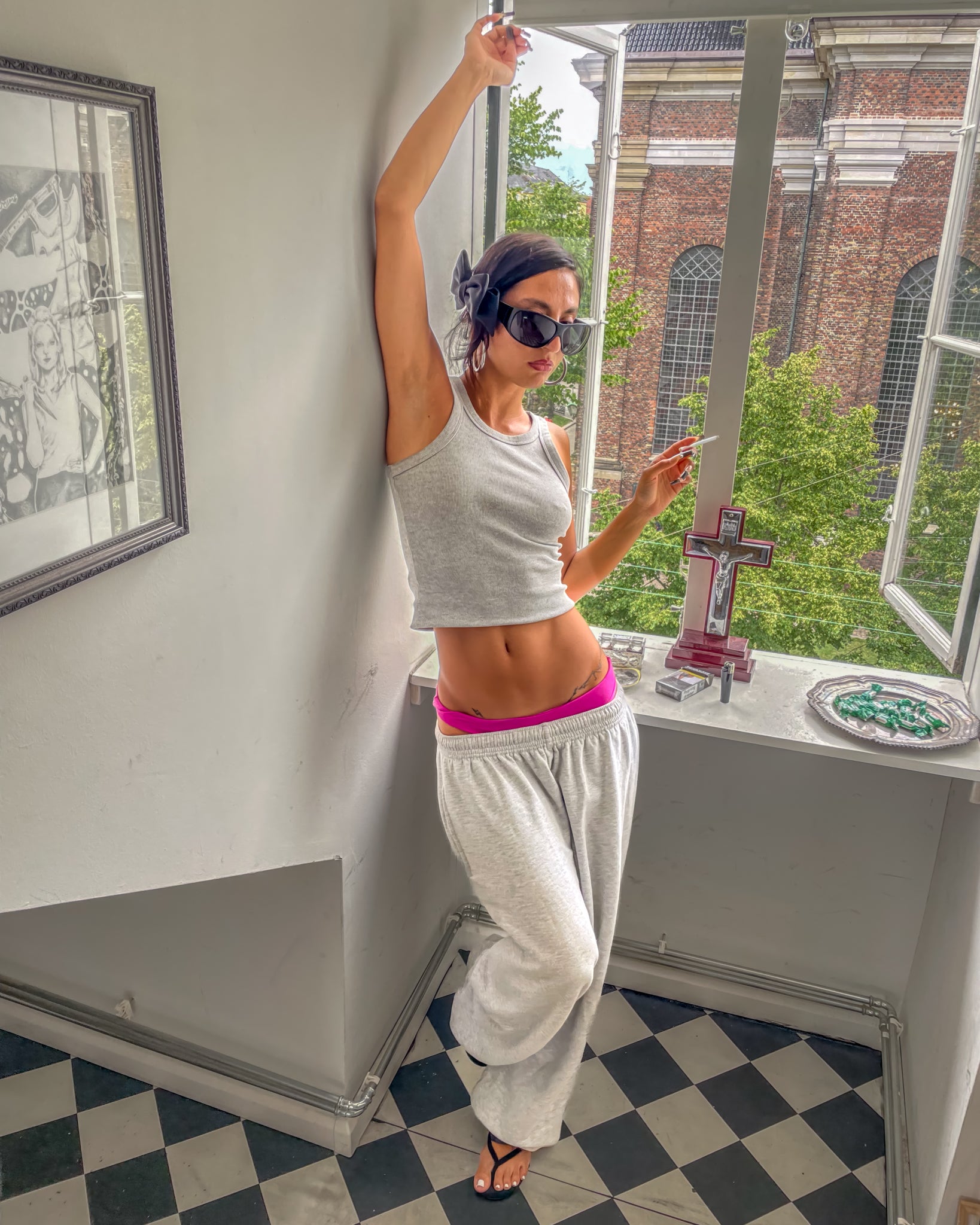 Parnoosh is 165 cm tall and wears size M. | grey